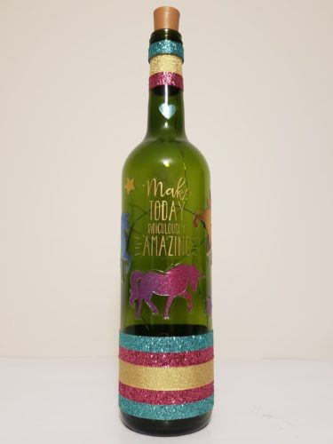 Bottle light with unicorns and phrase