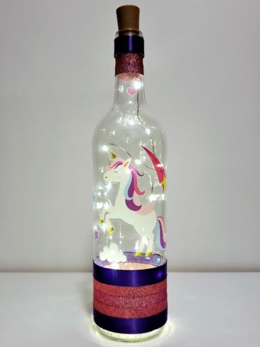 Bottle light with unicorn, stars and hearts.