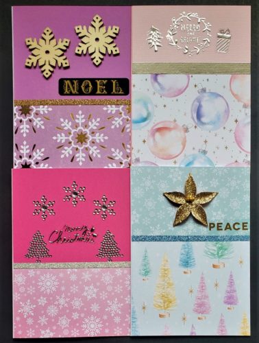 Four pack of Christmas cards with sugarplum prints, including ornaments, snowflakes and trees.