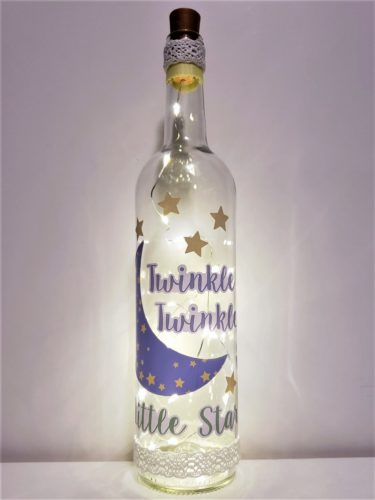 Bottle light with moon and stars, and phrase, "Twinkle, twinkle, little star".
