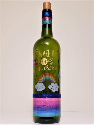 Bottle light with "Wake up and be awesome", flowers and a rainbow.
