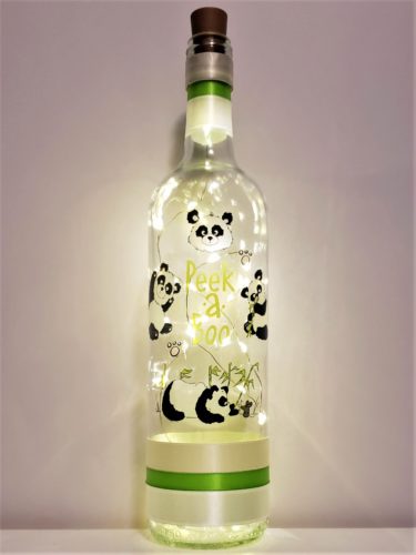 Bottle light for babies with pandas and "Peek a boo".