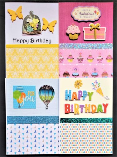 Four pack of birthday cards with party decorations and butterflies.
