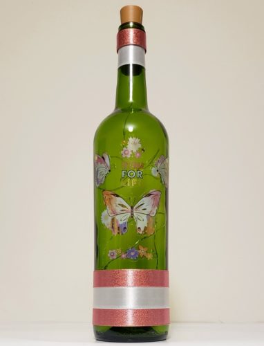 Bottle light with watercolour-style butterflies and "Friends for life".