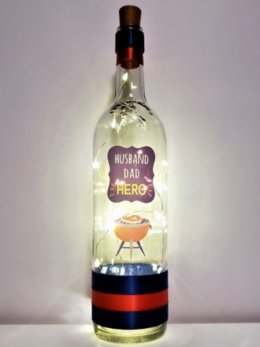 Bottle light with "Husband, Dad, Hero" and a BBQ.