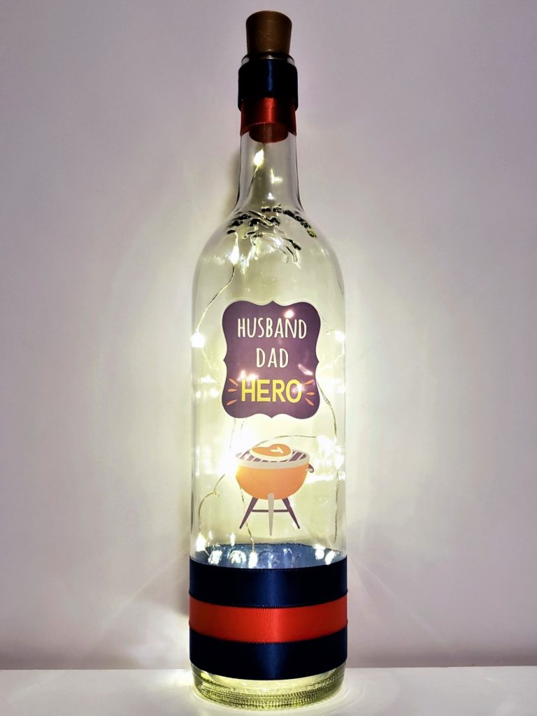 Bottle light with "Husband, Dad, Hero" and a BBQ.