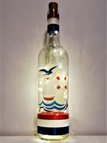 Father's Day bottle light with a nautical theme and "Dad" in silver.