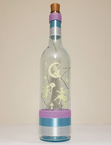 Bottle light with glow in the dark fairies.