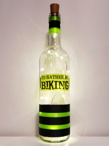A bottle light with the phrase, "I'd rather be biking".