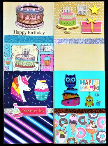 Four pack of adult and kids birthday cards with cake, owls, and unicorn.