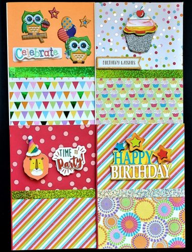 Four pack of kids birthday cards with cupcakes, owls and a lion.