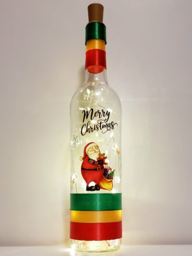 Bottle light featuring Santa with his sack and the words, "Merry Christmas".