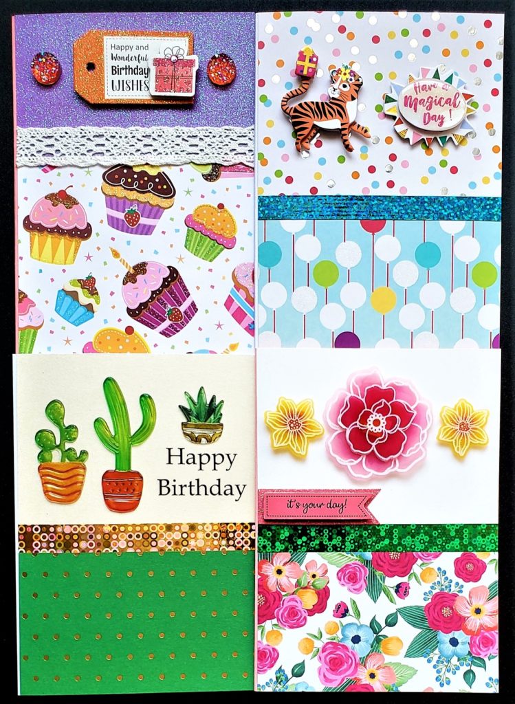 Four pack of adult and kids birthday cards with cupcakes, balloons, cacti, flowers and more.