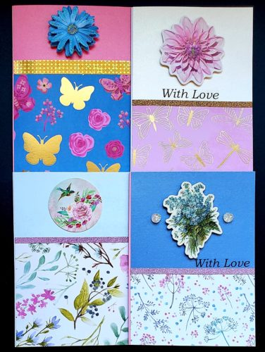 Four pack of multipurpose cards in bold blues and pinks, with butterfly and flower prints.