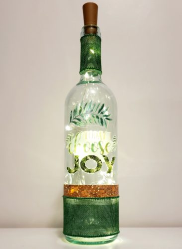 Bottle light with tropical fauna and the phrase, "Today I choose joy".