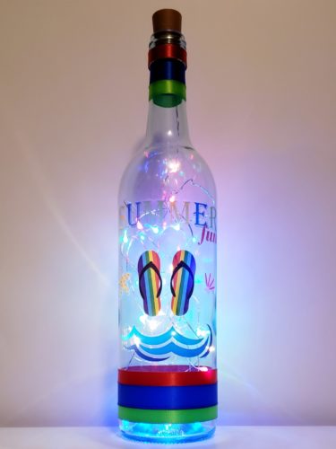 Bottle light featuring colourful flip flops, waves, and "Summer Fun".