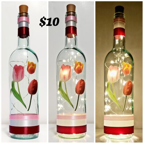 Photo grid of a bottle light with tulips shown with the lights off, with them on, and with them on in a dark room.