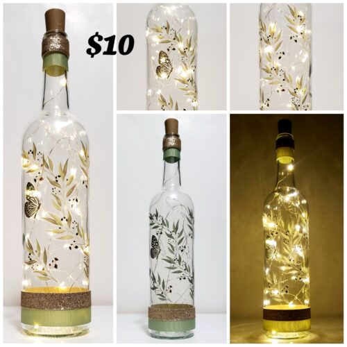 Photo grid of a bottle light featuring branches with leaves and gold touches, and a gold butterfly.